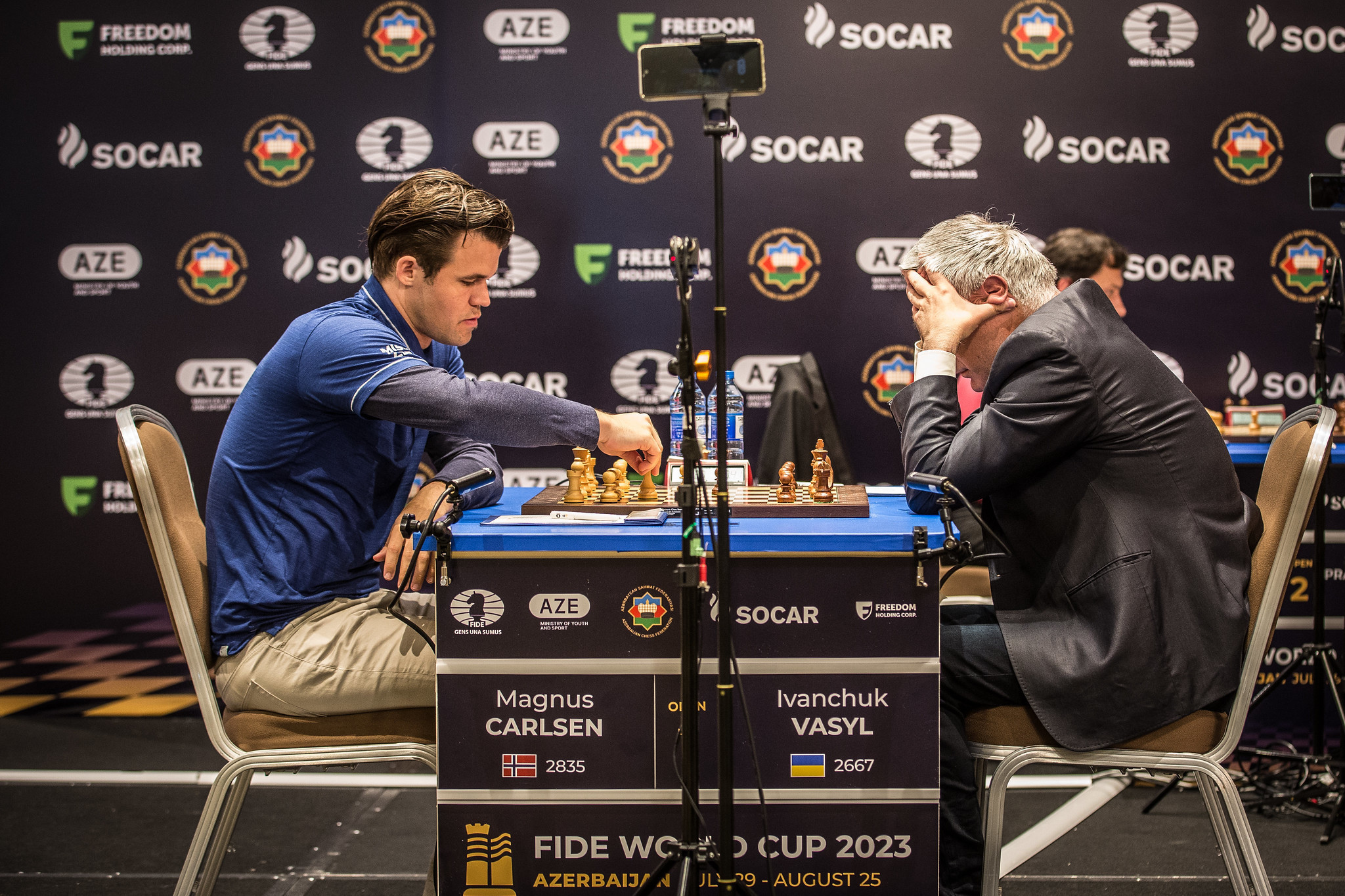 Carlsen and Tan seal key wins in round five openers at FIDE World